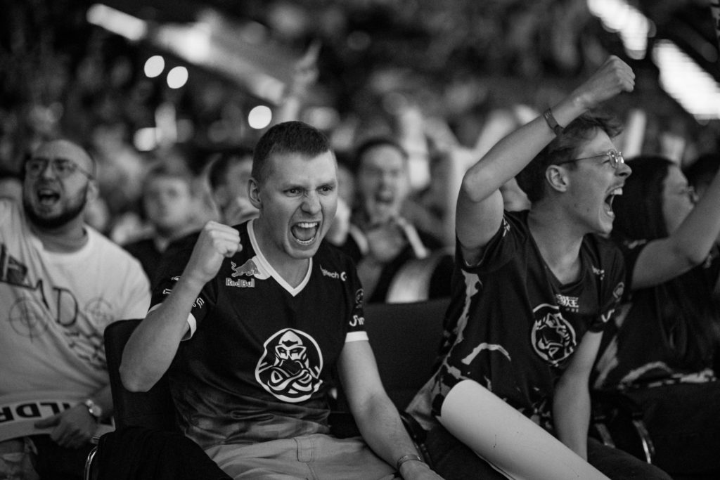 Two ENCE fans celebrate in the audience following a round win in the IEM Katowice quarterfinals - Photo by Freja Borne