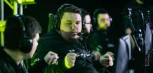 Image of UK Call of Duty player Beans fistbumping teammates on stage