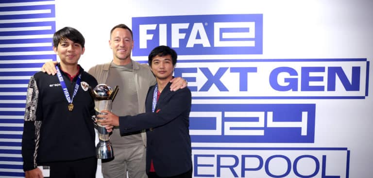 Ichsan Rahmat Taufiq (miracle), Manager of Indonesia and Budi Muhamad Manar Hidayat (wednesday), Assistant Manager of Indonesia, pose for a photo with the former footballer John Terry after winning the Football Manager Final in Liverpol (Photo by Alex Livesey - FIFA/FIFA via Getty Images)