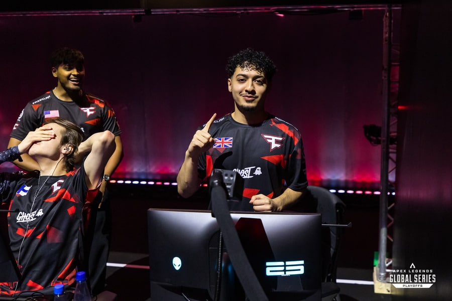 Two members of the FaZe roster, pictured at the ALGS Split 2 Playoffs shortly after being signed. Naghz stares straight into the camera while holding up one finger, showing off after winning a game. Sinetic is pictured off to the side, hand over his face to cover his emotion.