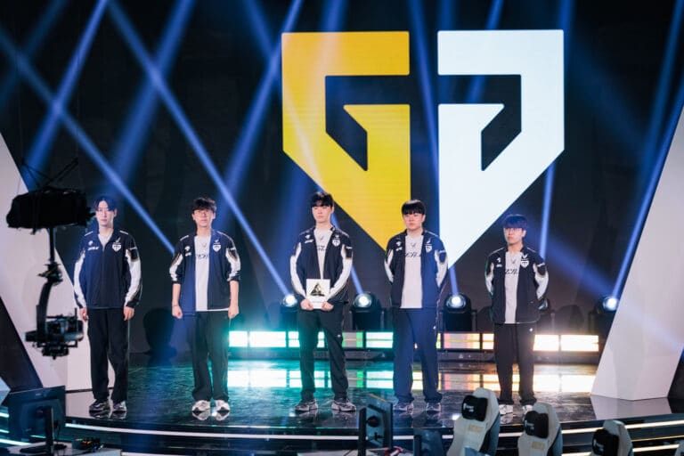 Gen.G stand in a line on the Esports World Cup stage with their logo projected behind them