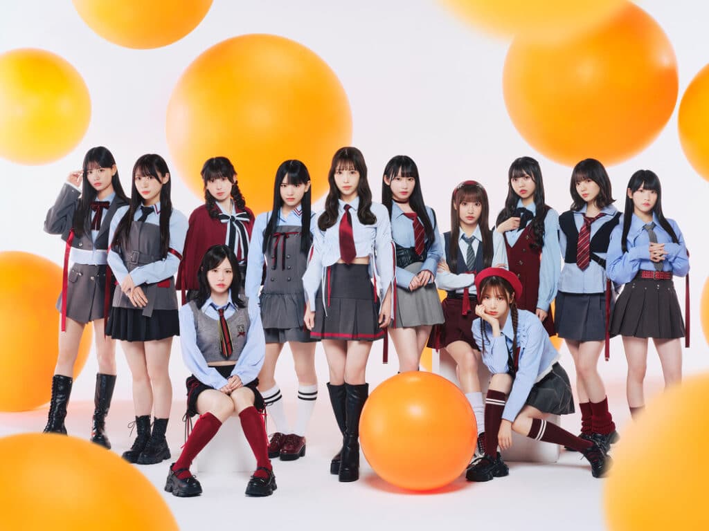 The SKE48 Valorant project has been announced - image shows members of SKE48 posed in front of an orange and white background.