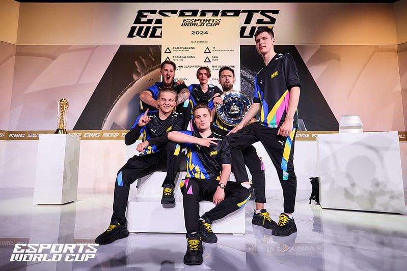 NAVI at the Esports World Cup CS2 tournament in 2024, posing with their trophy