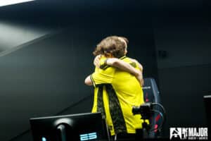 Zywoo embraces his teammates at the BLAST Austin Major
