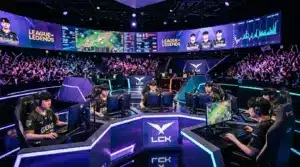 Professional esports players competing at a League of Legends tournament stage with dynamic lighting