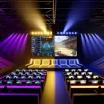 Split esports arena showing Mobile Legends and Counter-Strike 2 tournament stages with dramatic lighting