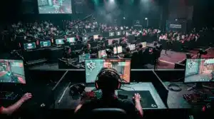 Esports tournament arena with players competing at illuminated gaming stations in professional Oceania venue