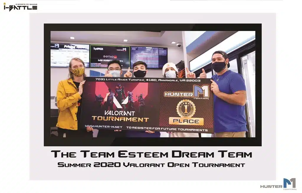 Four gamers celebrating their victory at a Valorant tournament with a large trophy sign.