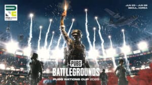 PUBG guy in the middle of a stadium, raising a trophy, amidst fireworks in the background.