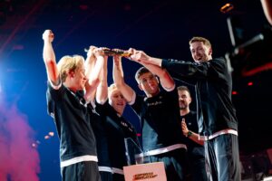 Virtus.pro hoist the PUBG trophy at the Esports World Cup.