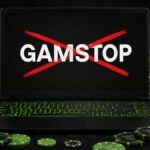 Non Gamstop casinos represented by the word Gamstop crossed out on a laptop