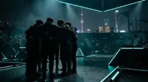 Five G2 esports players silhouetted together on a Shanghai tournament stage before a possible final run